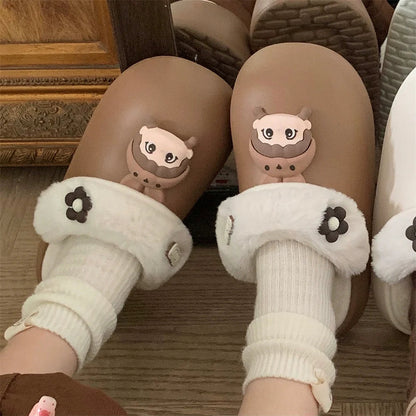 Playful Cartoon Shell Winter Clogs